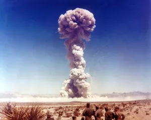 Atom Bombs Prints: The DOG shot. Military personnel observing a 21 kiloton atomic test