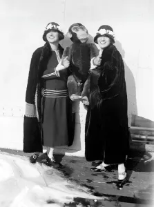 Dolly Prints: Dolly Sisters with a monkey doll, ca. 1923-25
