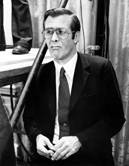 Donald Prints: DONALD RUMSFELD, as White House Chief of Staff during President Ford's news conference in which he named Rumsfeld