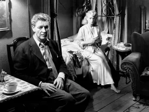 Sitting On Bed Prints: A DOUBLE LIFE, from left, Ronald Colman, Shelley Winters, 1947