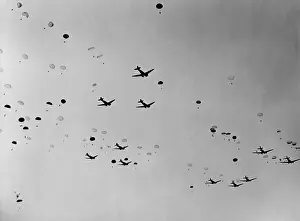 Parachutes Prints: Douglas C-47s were the backbone of World War 2 Airborne assault operations