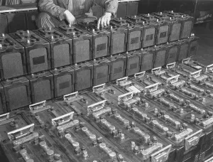 Battery Prints: Dozens of 12 volt rechargeable automobile batteries at a the White Motor Company