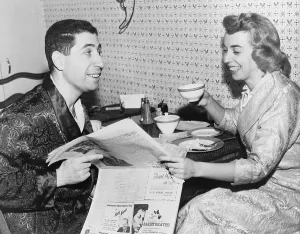 Psychologist Prints: Dr. Joyce Brothers (b. 1925) having breakfast and reading newspaper with her husband Milton