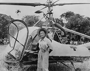 Rs4wn Bsloc Prints: Dr. Valerie Andre, in front of her helicopter in Tonkin, Vietnam, in 1952