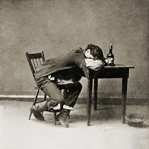 Young Man Prints: Drunk man with his head on table, 1874