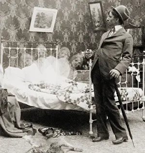 Husband Prints: Drunk man seeing vision of four headed women in bed in a humorous photo of 1897
