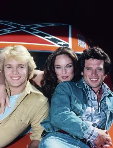 Rpall Prints: DUKES OF HAZZARD, (from left): John Schneider, Catherine Bach, Tom Wopat, 1979-85