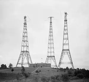 Broadcasting Prints: Dwarfing the substantial building beneath them