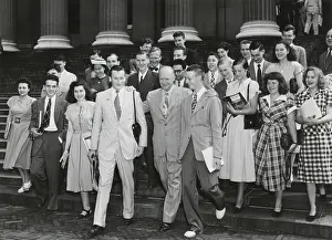 Lcgr1412 Prints: Dwight Eisenhower walking down the steps of Low Memorial Library with a group of foreign students