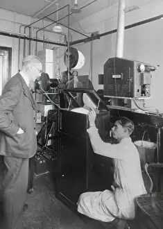 Broadcasting Prints: Early television with a viewing mirror that reflects the image of an encased picture tube