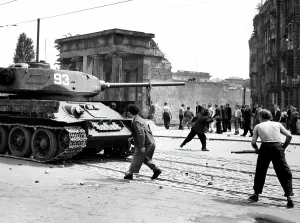 Tank Prints: East Berliners attack Soviet tanks, 6/17/53. Courtesy: CSU Archives / Everett Collection