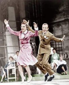 Flower In Lapel Prints: EASTER PARADE, from left: Judy Garland, Fred Astaire, 1948