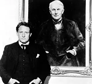 Edison Prints: EDISON, THE MAN, Spencer Tracy, on-set with a portrait of Thomas Edison, 1940