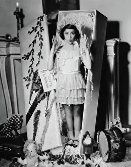 Pinafore Prints: Edith Fellows as a life-size Christmas present, Columbia publicity, mid-1930s