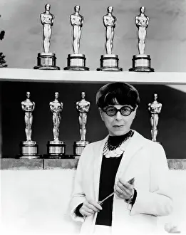 Edith Prints: EDITH HEAD, surrounded by the eight Oscars she has won during a distinguished career