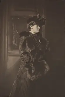 Coat Prints: Edith Wharton, wears a feathered hat