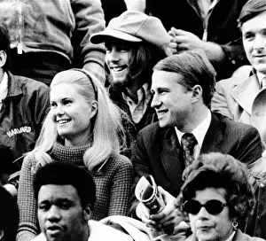 Cambridge Prints: Edward and Tricia Nixon Cox enjoy the football game at Harvard Stadium
