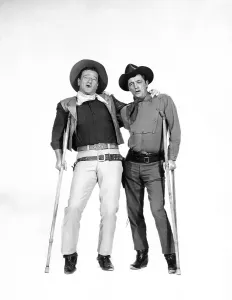 Crutches Prints: EL DORADO, John Wayne, Robert Mitchum, 1966
