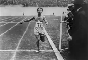 Olympics Prints: El Quafi of South Africa winning the Olympic marathon for France