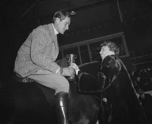 Equestrians Prints: Eleanor Roosevelt presents a trophy to actor Errol Flynn