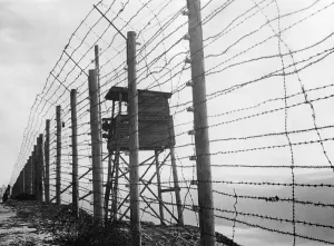 Resistance Prints: Electrified barbed wire fence and guard house at Struthof Concentration Camp near Natzweiler