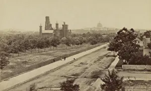 Cityscape Prints: Elevated view of the Smithsonian Institution building in the near distance with the Capitol building in the background