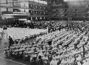 Militants Prints: Elijah Muhammad addressing an assembly of white gowned Muslim followers in New York City in 1964