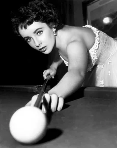 Pool Prints: Elizabeth Taylor playing pool on the set of A PLACE IN THE SUN, 1951