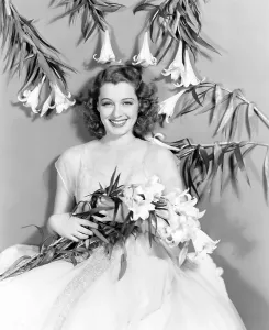 Bouquet Prints: Ellen Drew, celebrating Easter with lilies, 1940