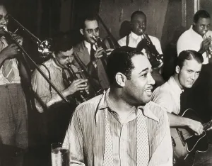 Ellington Prints: ELLINGTON, Duke (1899-1947). Duke Ellington in a performance with the guitarist Eddie Condor (right)