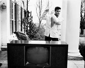 Tv Set Prints: Elvis Presley, on the Graceland porch with a new RCA television, 1960