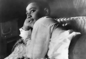 Shot Prints: Emmett Till lying on his bed in his Chicago home in 1955