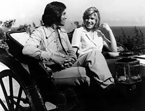 Murray Prints: Englebert Humperdinck and Ann Murray take a ride in an old-fashioned buggy in Bermuda