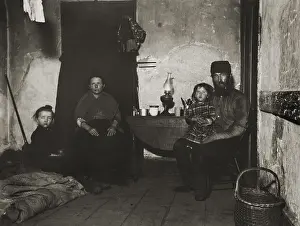 Dwelling Prints: An English coal-heavers family at home in Poverty Gap, in New York Citys Lower East Side