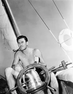 Movie Stars Prints: ERROL FLYNN relaxing on his yacht, 10/20/37