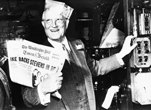 Showing Prints: Eugene Meyer holds the first copy of the new Washington Post and Times Herald