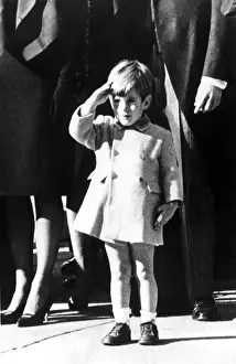 Catalog Images Prints: EV 1808 - John F. Kennedy, Jr. salutes as his father's coffin is taken to St