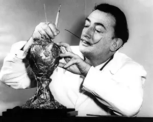History Prints: EV1879 - Artist Salvador Dali working on the sculpture The Chalice of Life