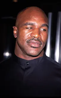 Shaved Head Prints: Evander Holyfield at premier of 'In Too Deep'