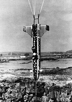 Rocket Prints: Evel Knievel and his rocket are suspended by parachute as he heads straight down into the Snake River Canyon