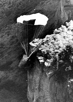 Parachute Prints: Evel Knievel's skycycle hits the side of Snake River Canyon and his parachute starts to collapse above him