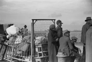 Economic Crisis Prints: Evicted African-American sharecroppers stranded in the January cold with their belongings