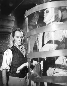 Kingston Prints: THE EVIL OF FRANKENSTEIN, from left: Peter Cushing, Kiwi Kingston, 1964