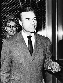 Racer Prints: Ex-diplomat Porfirio Rubirosa, arriving at the NYC District Attorney's office for questioning
