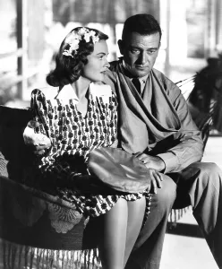 THEY WERE EXPENDABLE, from left: Donna Reed, John Wayne, 1945