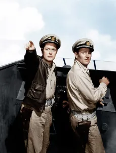 Leather Jacket Prints: THEY WERE EXPENDABLE, from left: Robert Montgomery, John Wayne, 1945