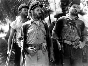 Crutches Prints: THEY WERE EXPENDABLE, Ward Bond, Robert Montgomery, John Wayne, 1945