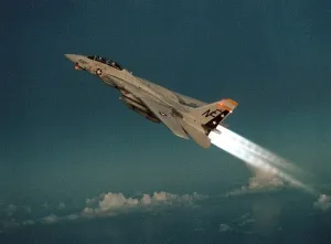 Bombers Prints: F-14 Tomcat Fighter climbs with its afterburners ignited during a take-off of the aircraft carrier USS RANGER