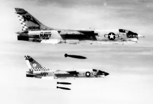 Bombs Prints: F-8 aircraft release bombs on North Vietnamese troop concentrations in South Vietnam