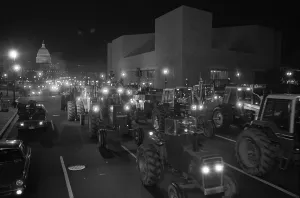 Protesters Prints: Farmers driving tractors down Pennsylvania Avenue as part of a night time American Agriculture Movement AAM protest for